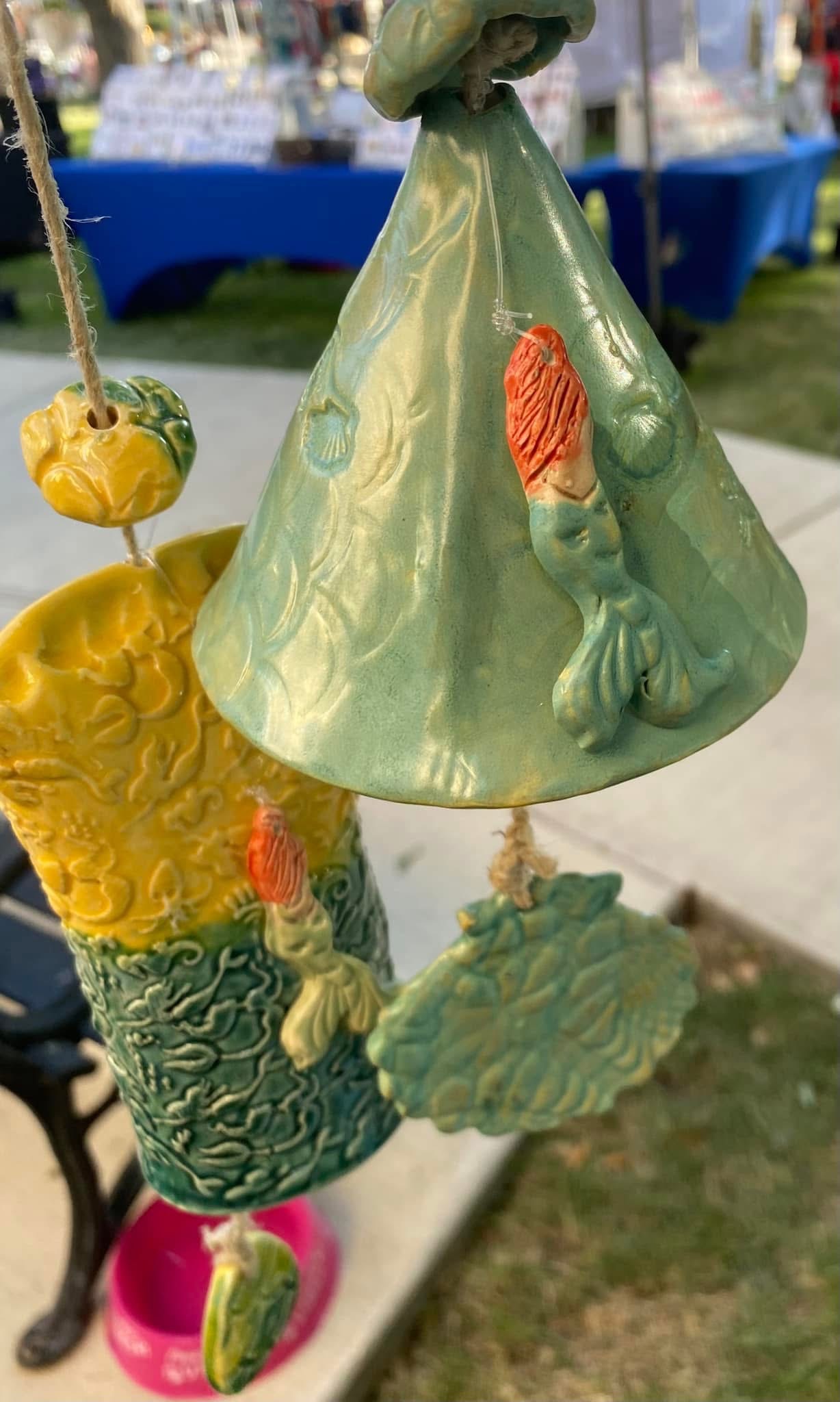 Green and yellow ceramic bells