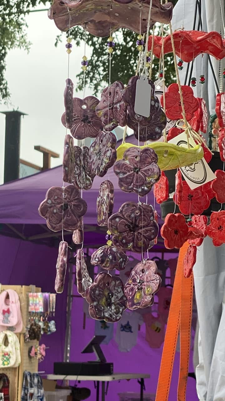 Purple flower chime at an outdoor market